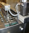 Cup_filling_and_sealing_machine_283