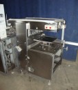 Cup_filling_and_sealing_machine_328